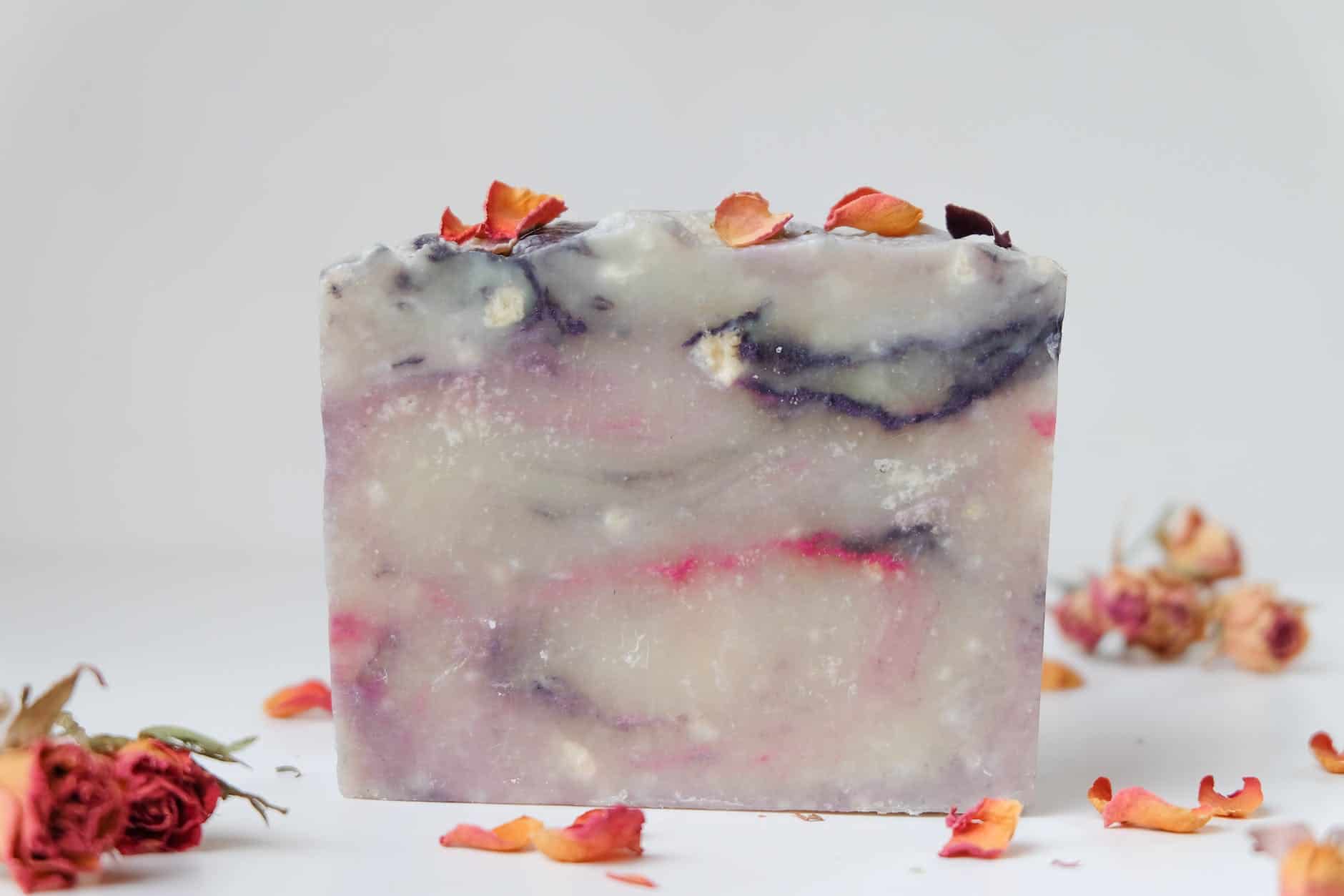 close up of organic soap bar on white background